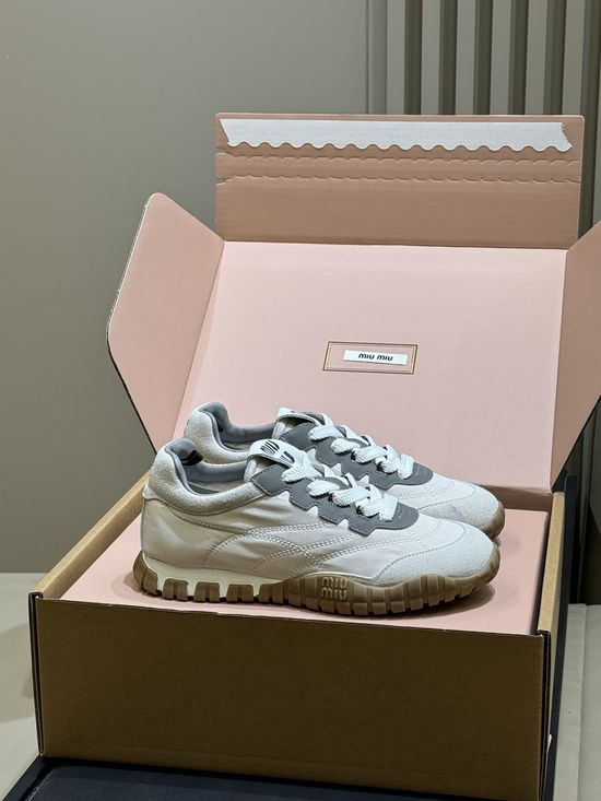 Miu Miu Retro-Inspired Training Shoes with Tire-Tread Soles