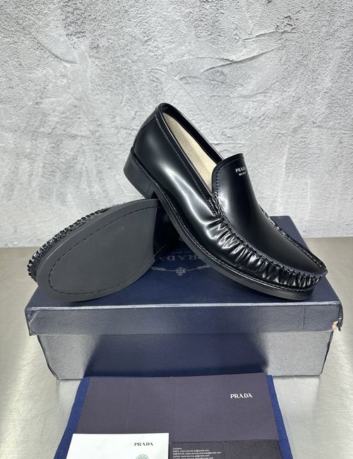 Prada Shuffle Logo Embellished Monk Loafers