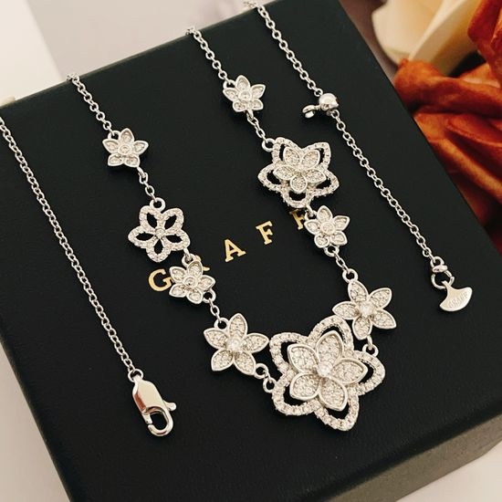 Polo Ralph Lauren Silver Hollow Flower Pendant Necklace