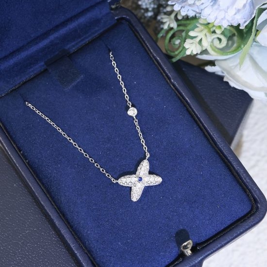 Chaumet Blue Diamond Cross Necklace