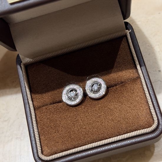 Piaget Brushed Carved Single Diamond Circle Earrings