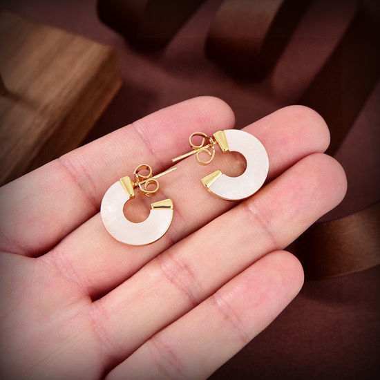 Vivienne Westhood Mother of Pearl Saturn Stud Earrings