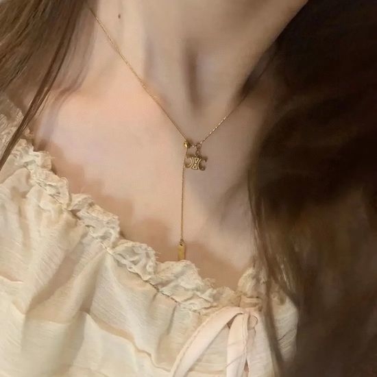 Celine Hollow Carved Pendant Necklace